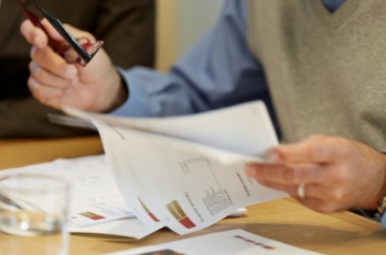 Financial Advisor going over paperwork with client